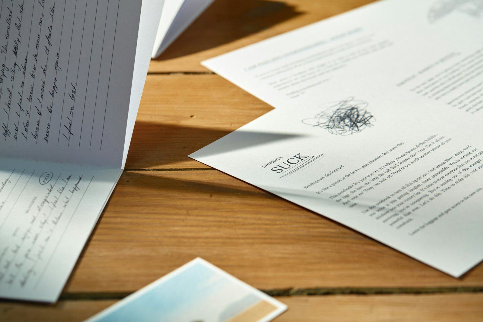 Incorporation paperwork and figures spread across a desk