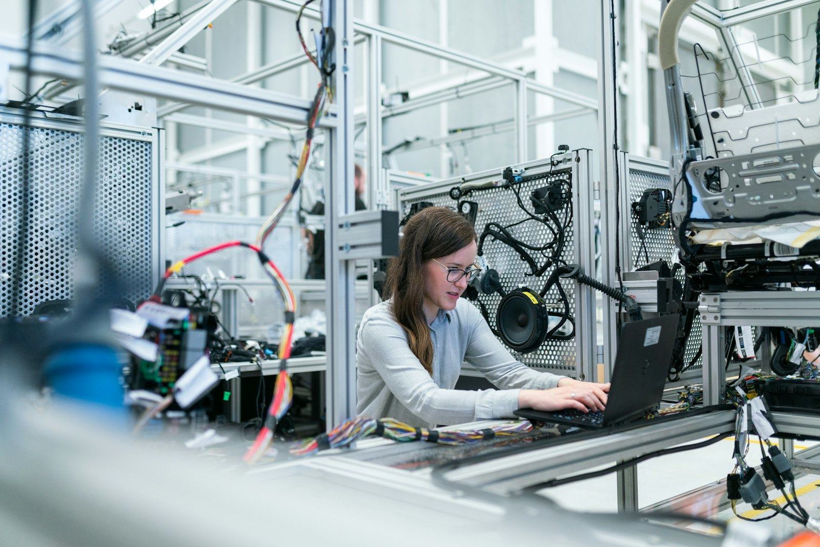 A person working at a technical workstation